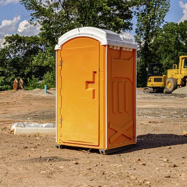 how often are the portable restrooms cleaned and serviced during a rental period in Mabie